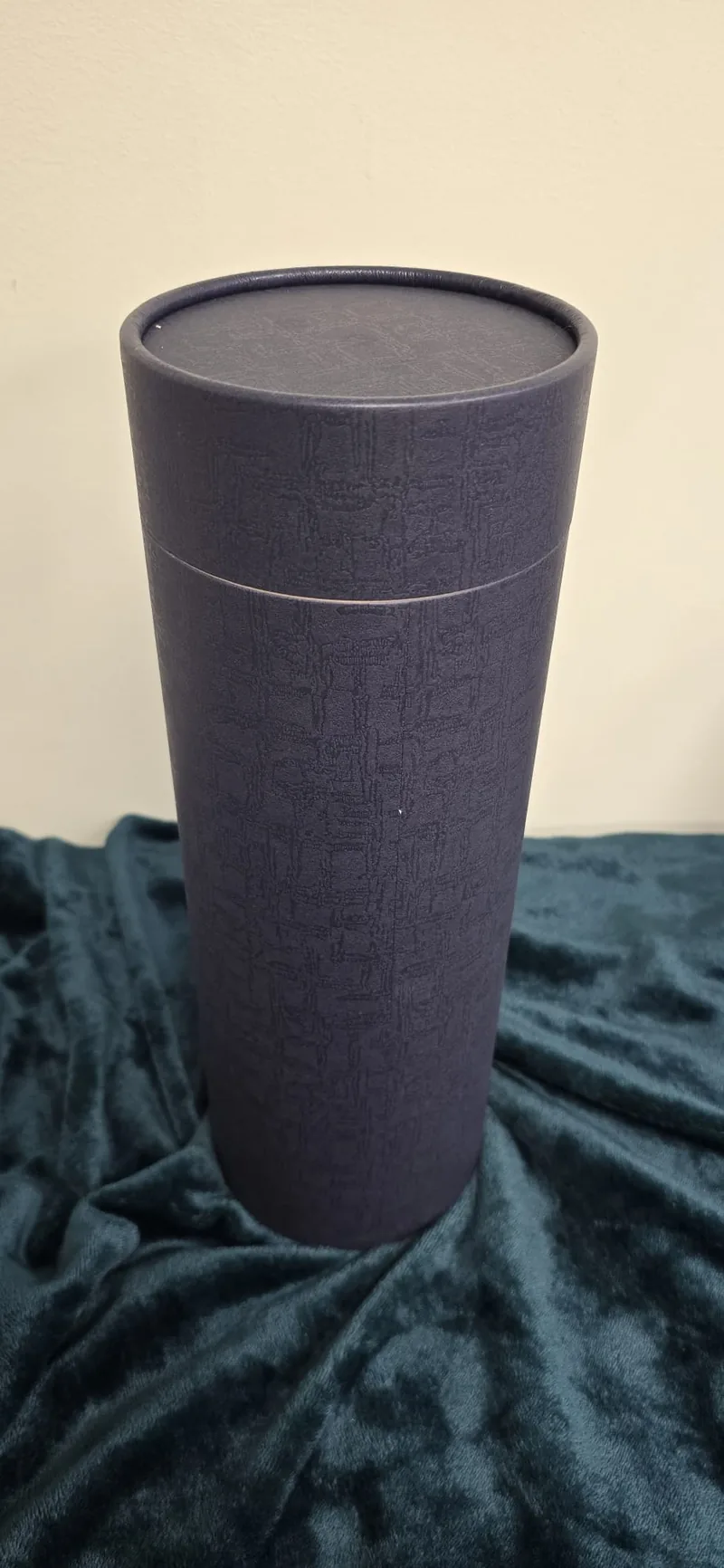 A plain tube in charcoal