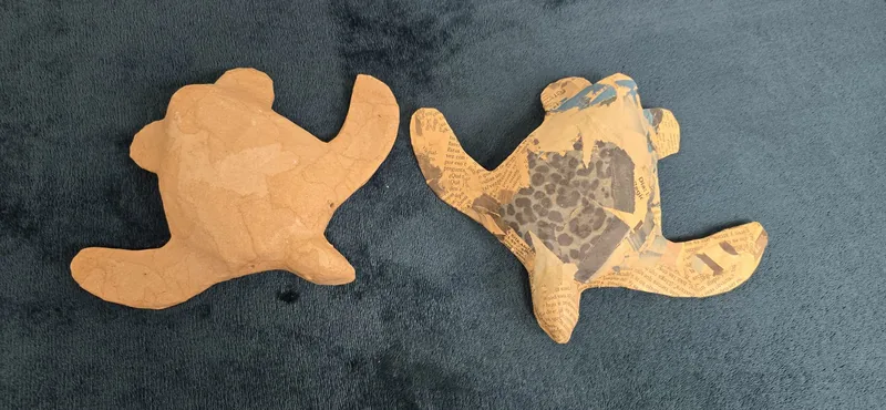 A pair of small carved turtle keepsakes